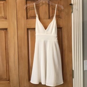 Formal white dress above knee  tie bow in back